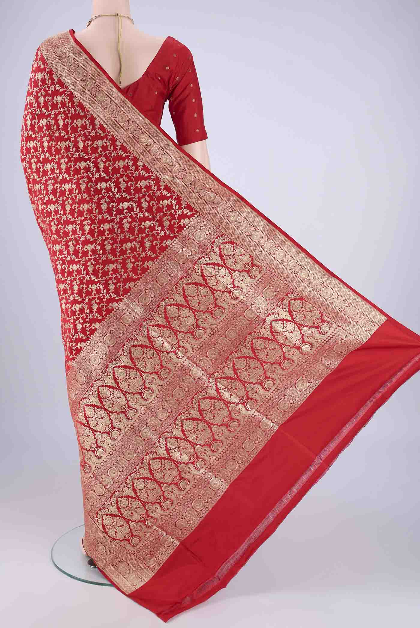 Flat view of Red Banarasi Silk Saree with Zari Brocade on the body and Zari Border. 