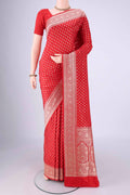 Red Banarasi Silk Saree with Zari Butta on the body and Zari Border.  displayed on a mannequin