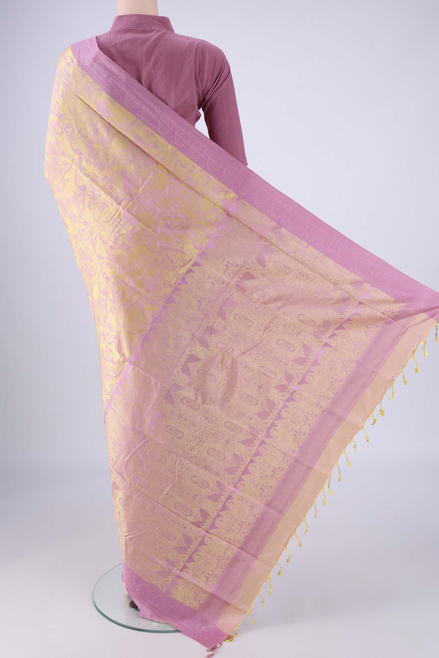 Flat view of Golden Peach Soft Silk Saree with Jacquard design on the body and Thread Border. 
