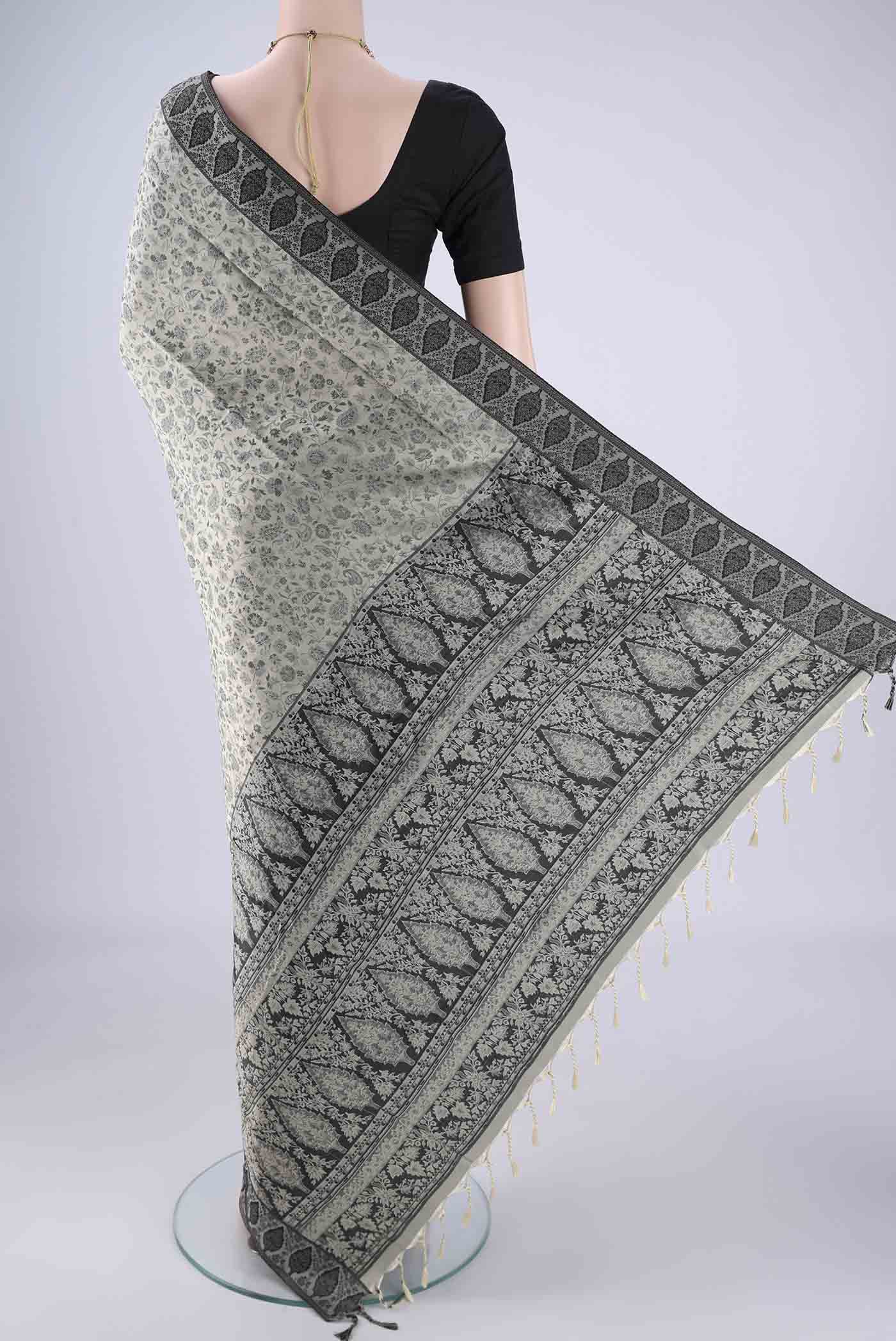 Flat view of Davys Grey Soft Silk Saree with Jacquard design on the body and Thread Border. 
