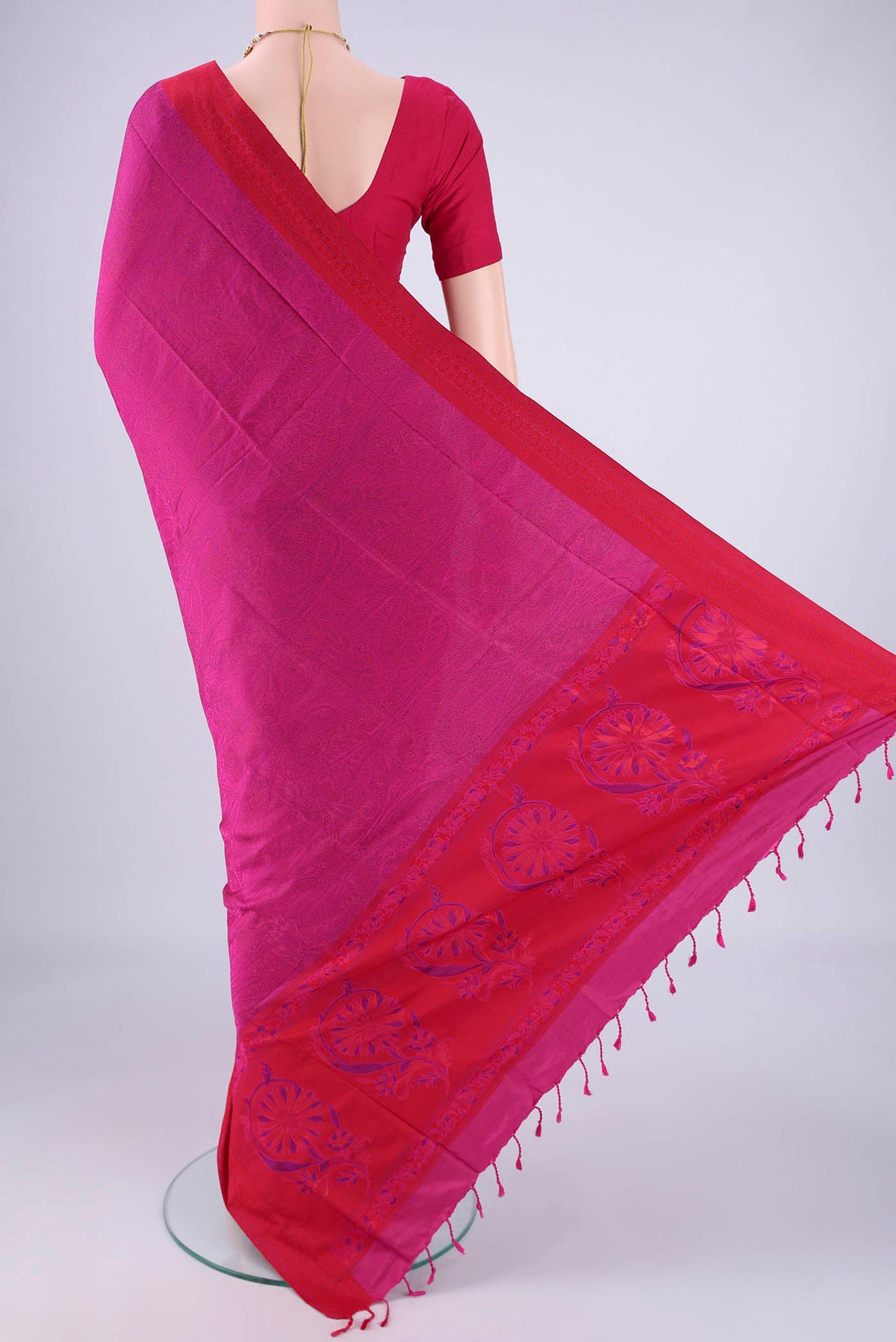 Flat view of Rani Pink Soft Silk Saree with Jacquard design on the body and Thread Border. 