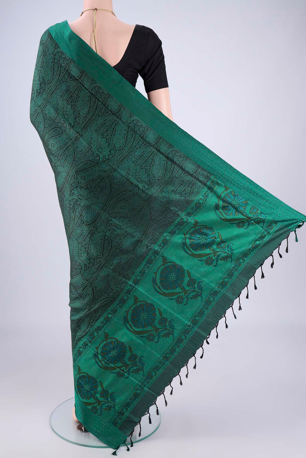 Flat view of Bottle Green Soft Silk Saree with Jacquard design on the body and Thread Border. 