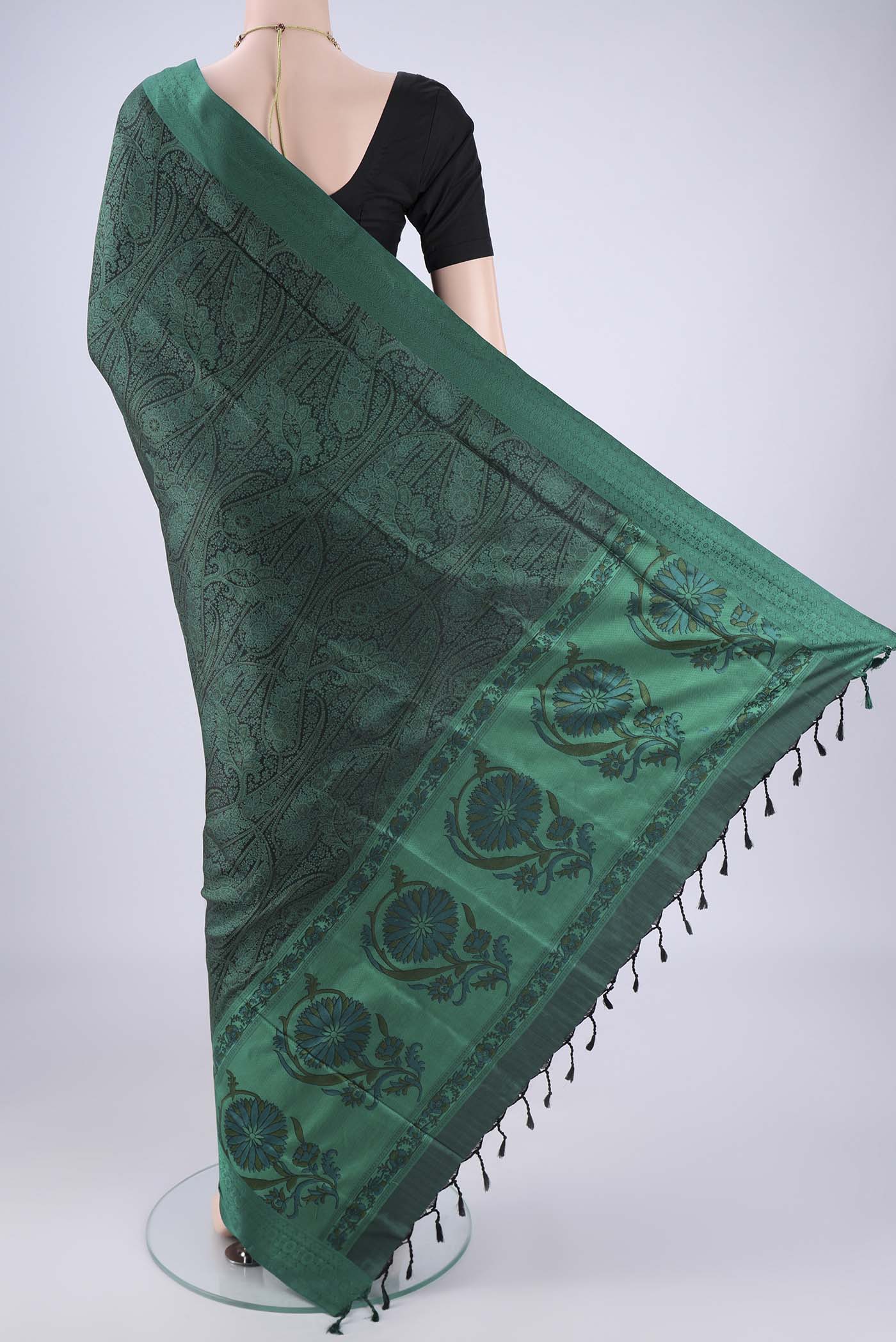 Flat view of Bottle Green Soft Silk Saree with Jacquard design on the body and Thread Border. 