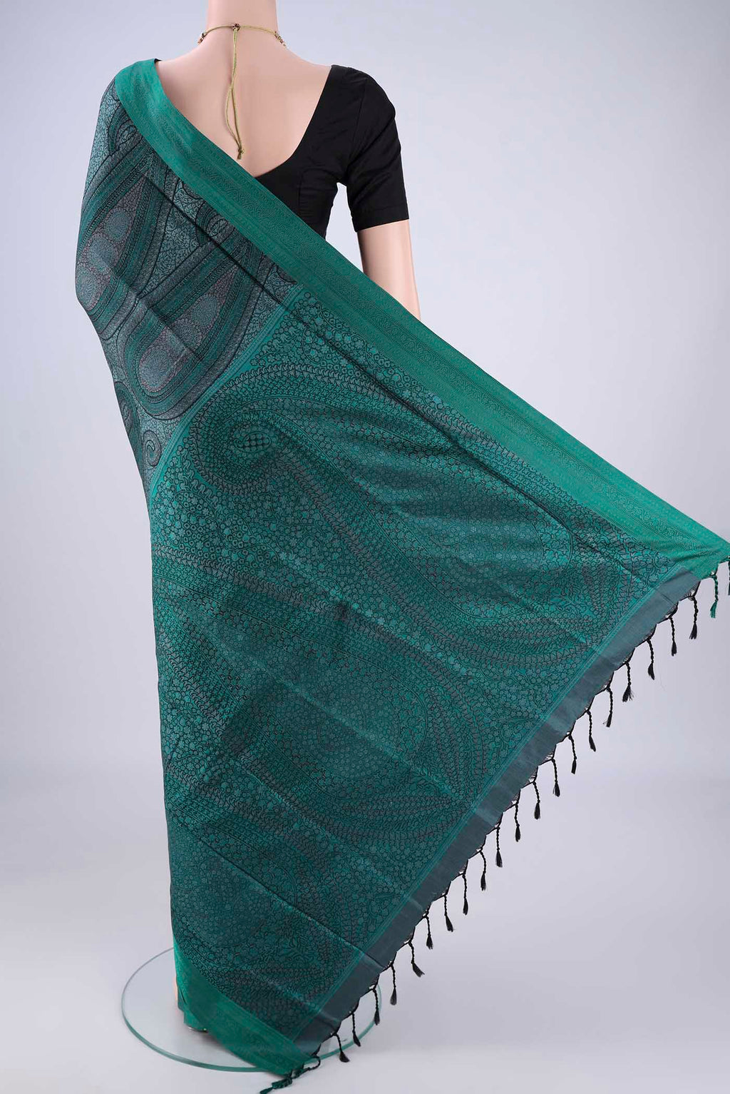 Flat view of Bottle Green Soft Silk Saree with Jacquard design on the body and Thread Border. 