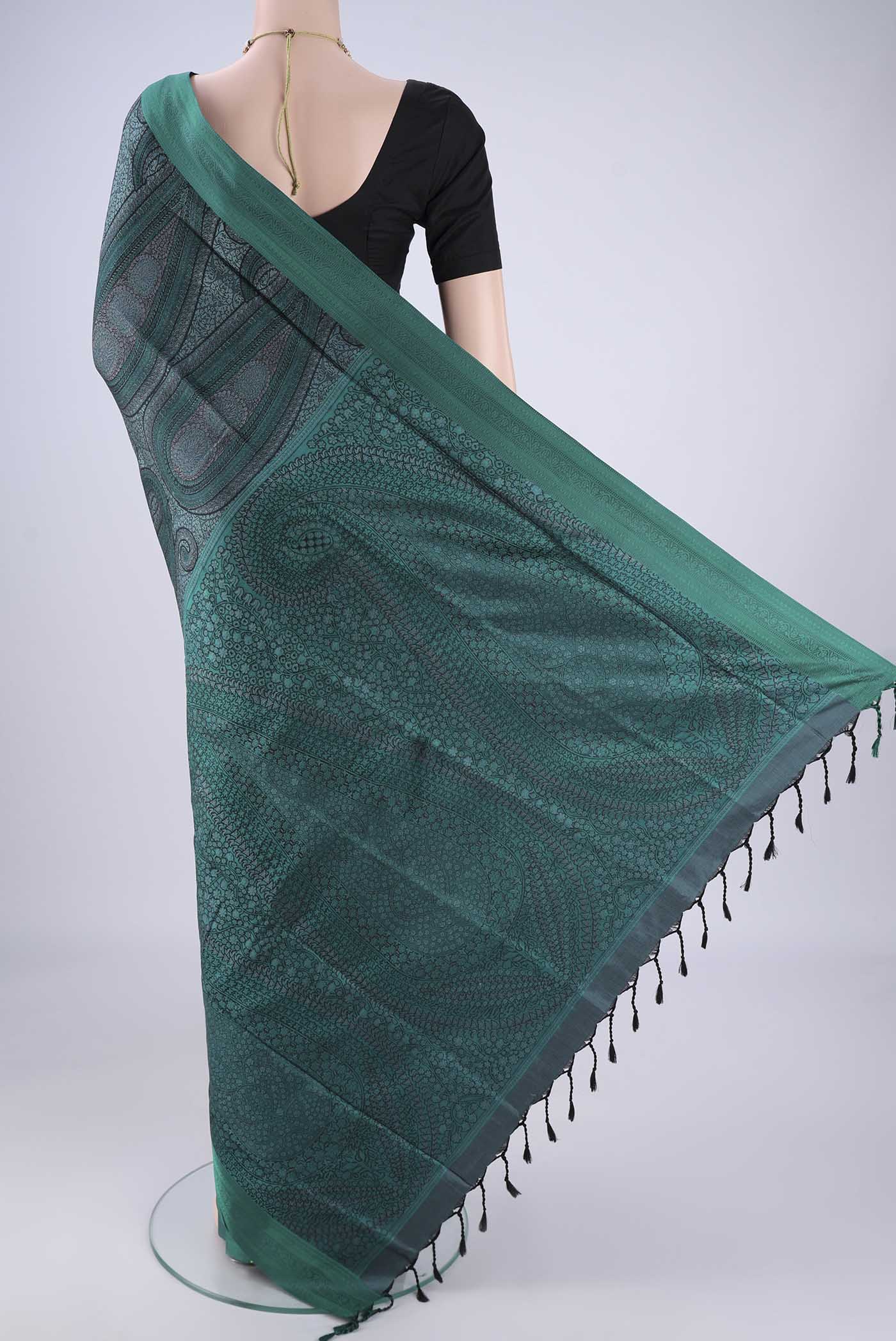 Flat view of Bottle Green Soft Silk Saree with Jacquard design on the body and Thread Border. 