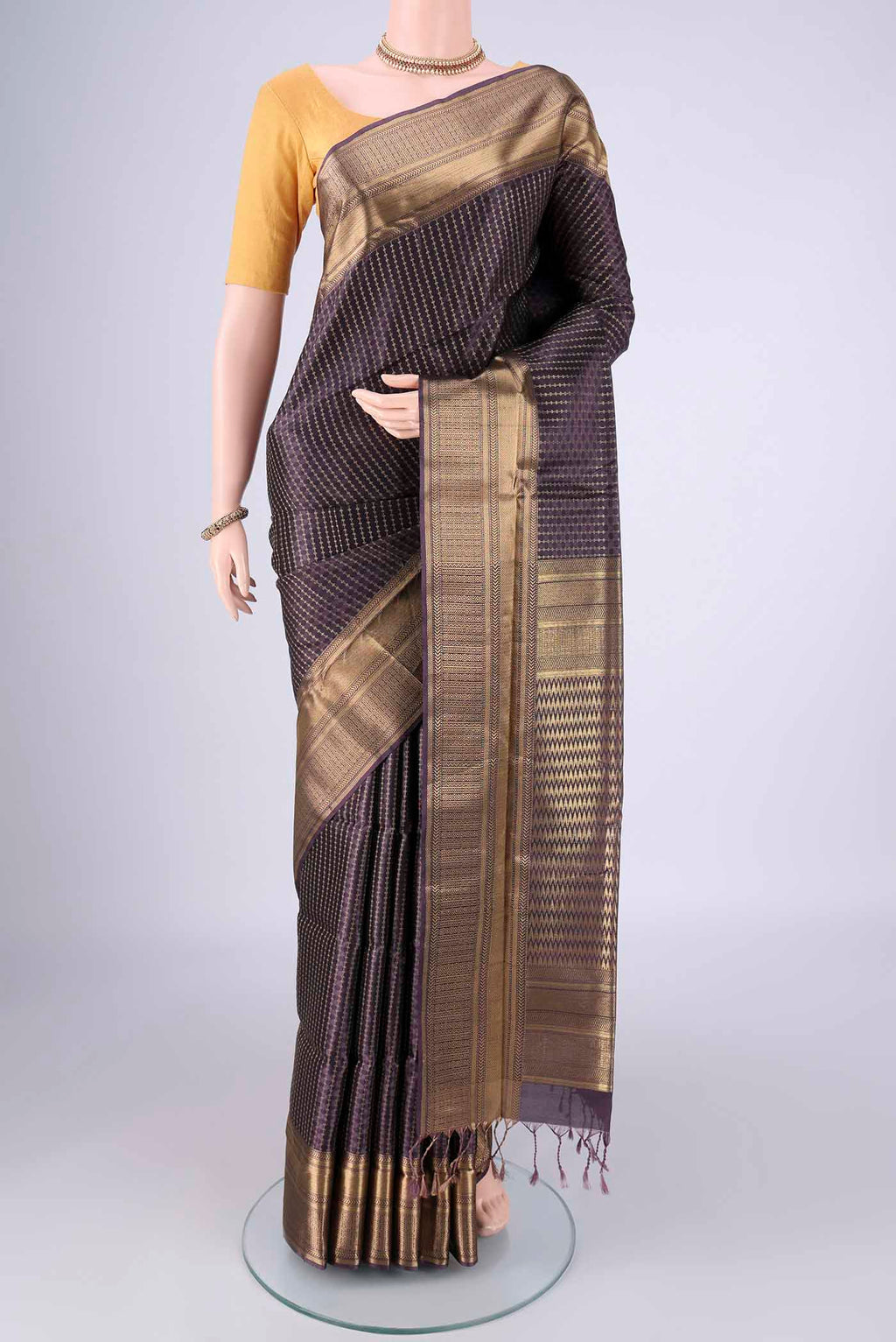Purple Soft Silk Saree with Jacquard With Zari Butta on the body and Zari Border.  displayed on a mannequin