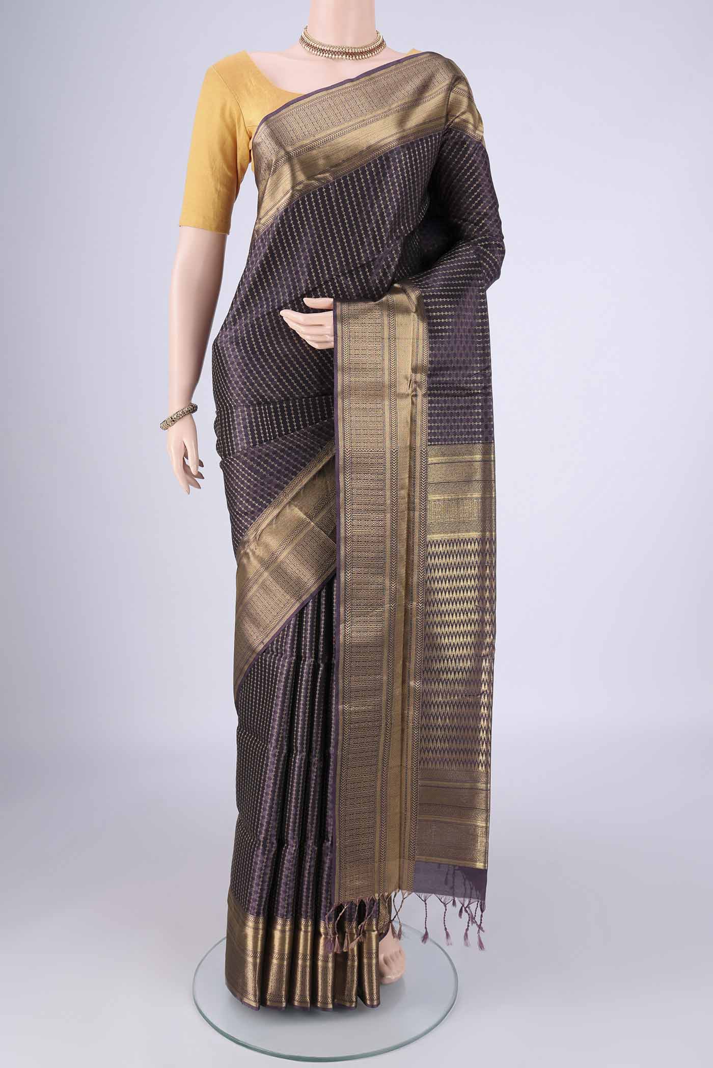 Purple Soft Silk Saree with Jacquard With Zari Butta on the body and Zari Border.  displayed on a mannequin