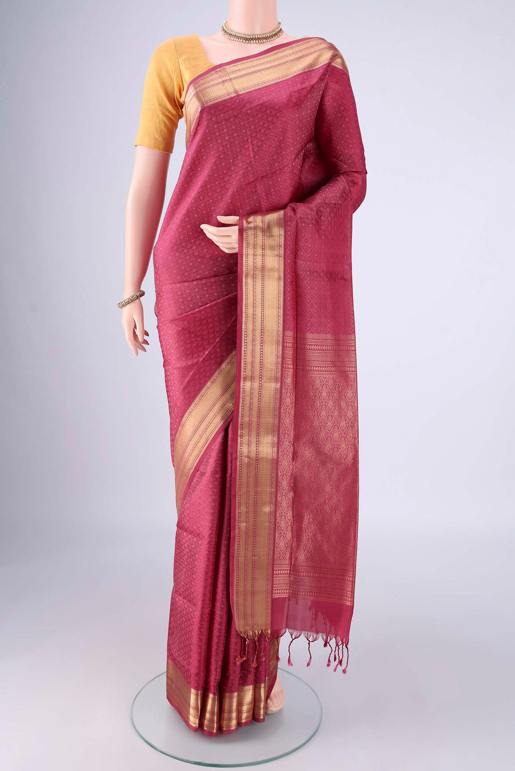 Pink Soft Silk Saree with Jacquard With Zari Butta on the body and Zari Border.  displayed on a mannequin