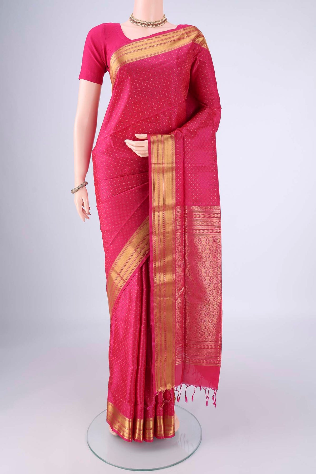 Pink Soft Silk Saree with Jacquard With Zari Butta on the body and Zari Border.  displayed on a mannequin