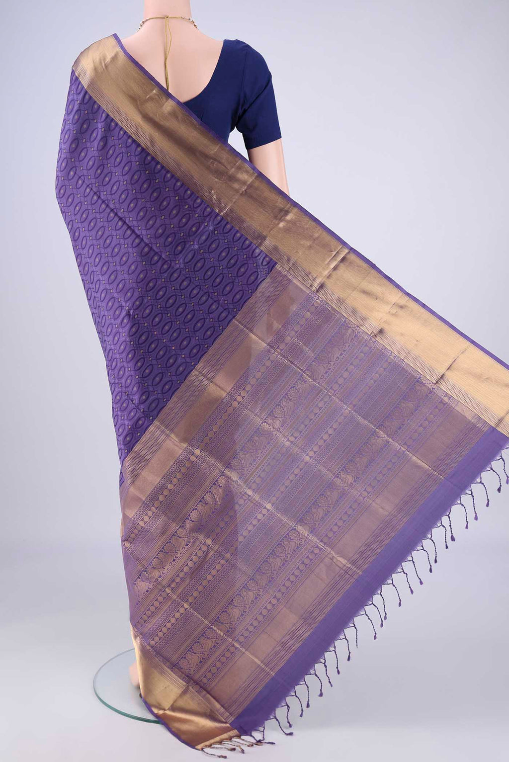 Flat view of Violet Soft Silk Saree with Jacquard With Zari Butta on the body and Zari Border. 