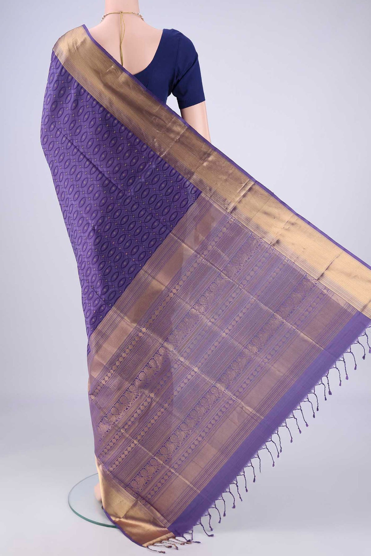 Flat view of Violet Soft Silk Saree with Jacquard With Zari Butta on the body and Zari Border. 
