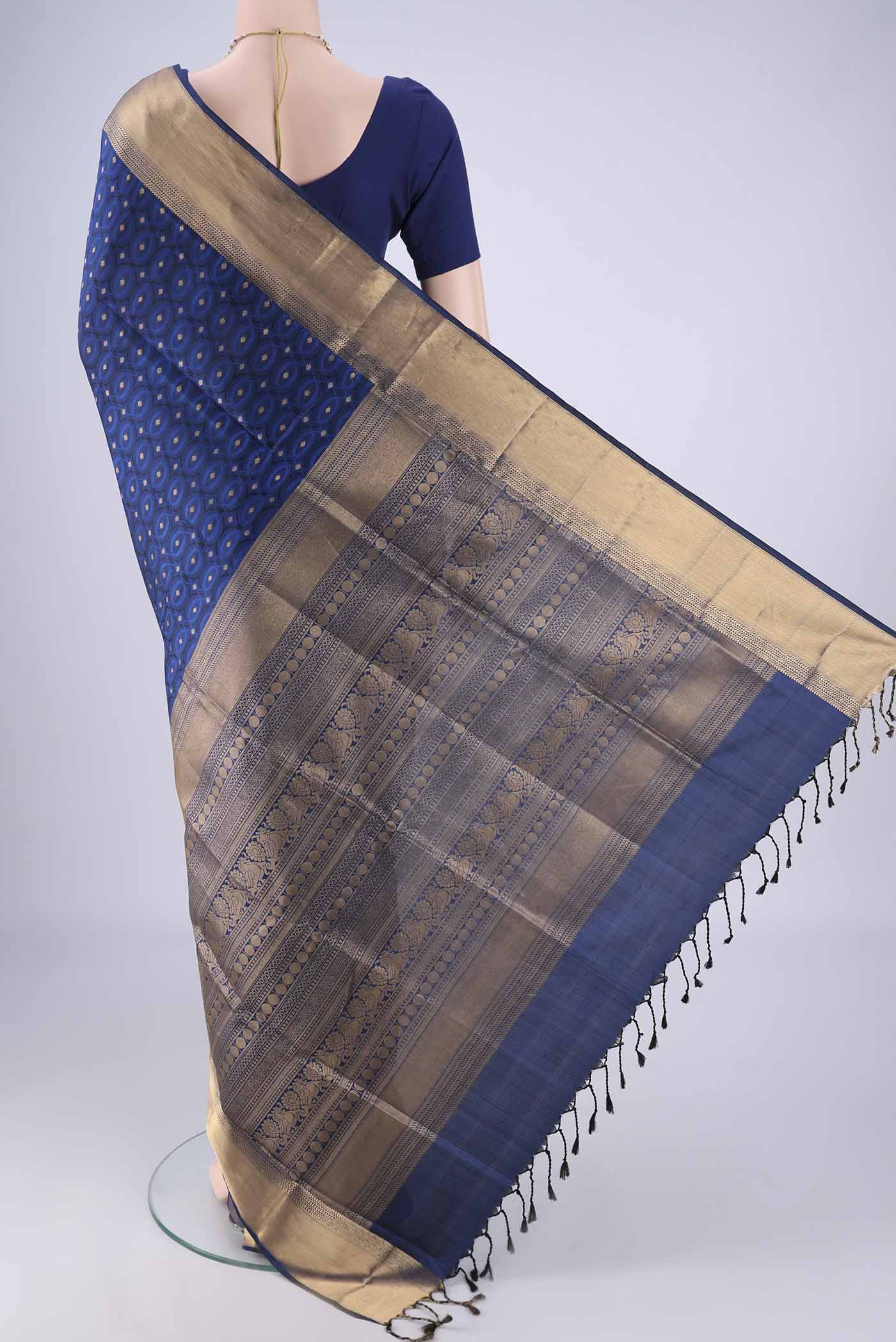Flat view of Dark Blue Soft Silk Saree with Jacquard With Zari Butta on the body and Zari Border. 