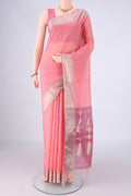Peach Kora Cotton Saree with Zari Butta on the body and Zari Border.  displayed on a mannequin