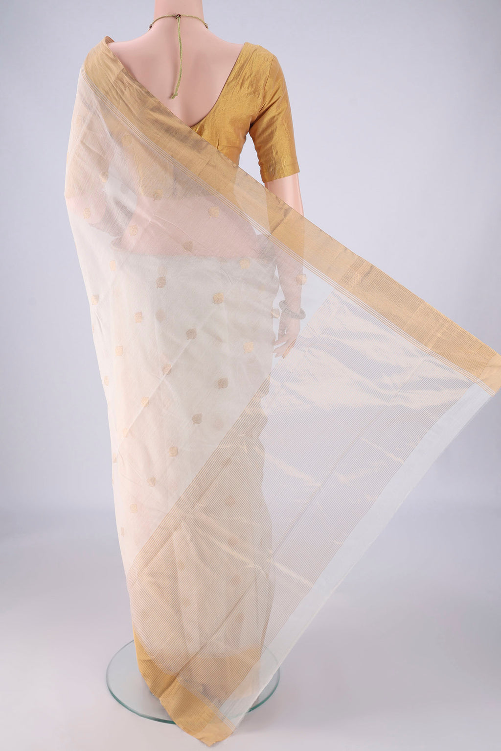 Flat view of Off White Chanderi Silk Cotton Saree with Zari Butta on the body and Zari Border. 