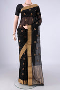 Black Silk Cotton Saree with Zari And Thread Butta on the body and Zari Border.  displayed on a mannequin