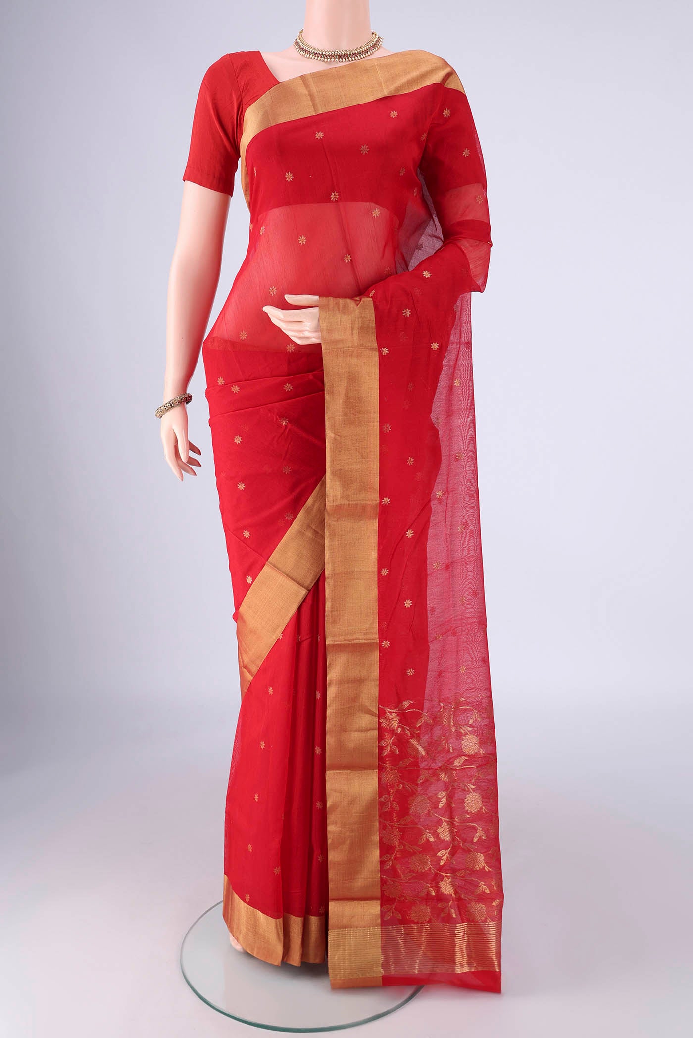Red Chanderi Silk Cotton Saree with Zari Butta on the body and Zari Border.  displayed on a mannequin