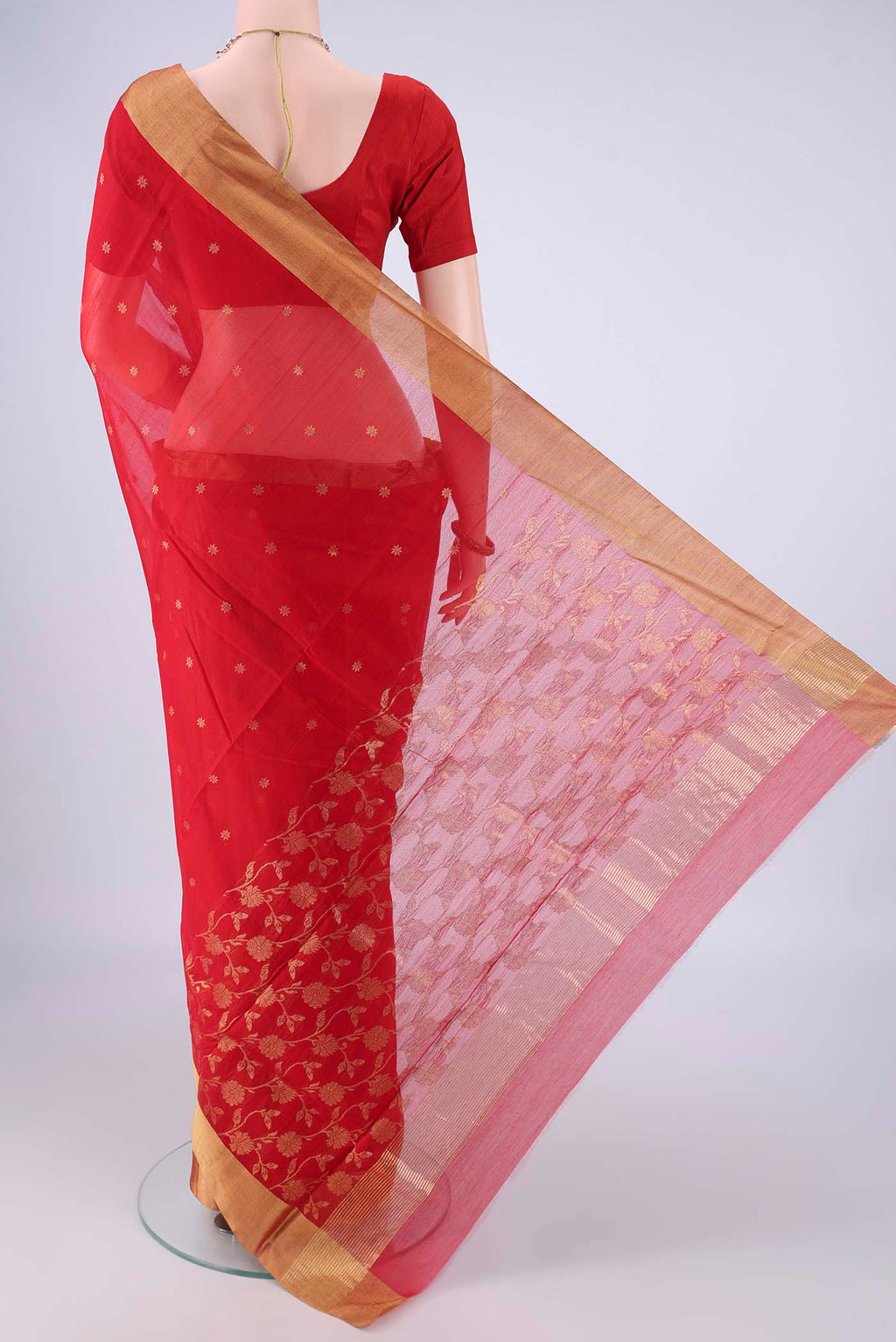 Flat view of Red Chanderi Silk Cotton Saree with Zari Butta on the body and Zari Border. 