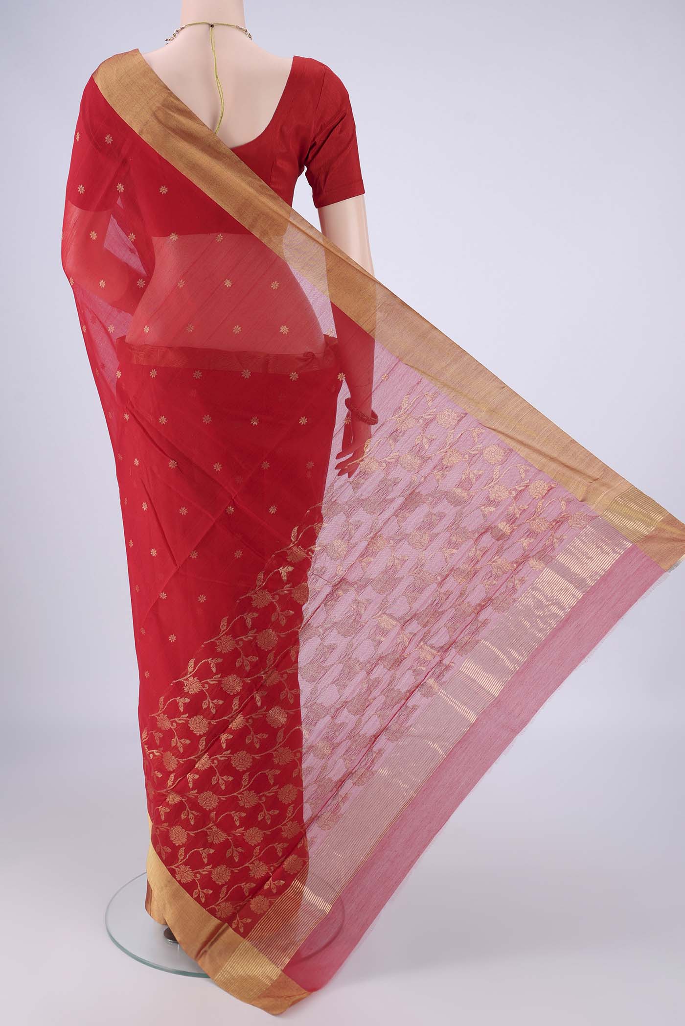 Flat view of Red Chanderi Silk Cotton Saree with Zari Butta on the body and Zari Border. 