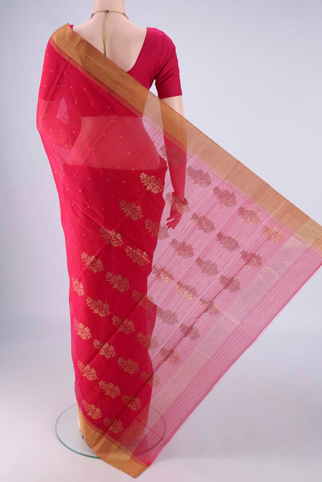Flat view of Dark Pink Chanderi Silk Cotton Saree with Zari Butta on the body and Zari Border. 