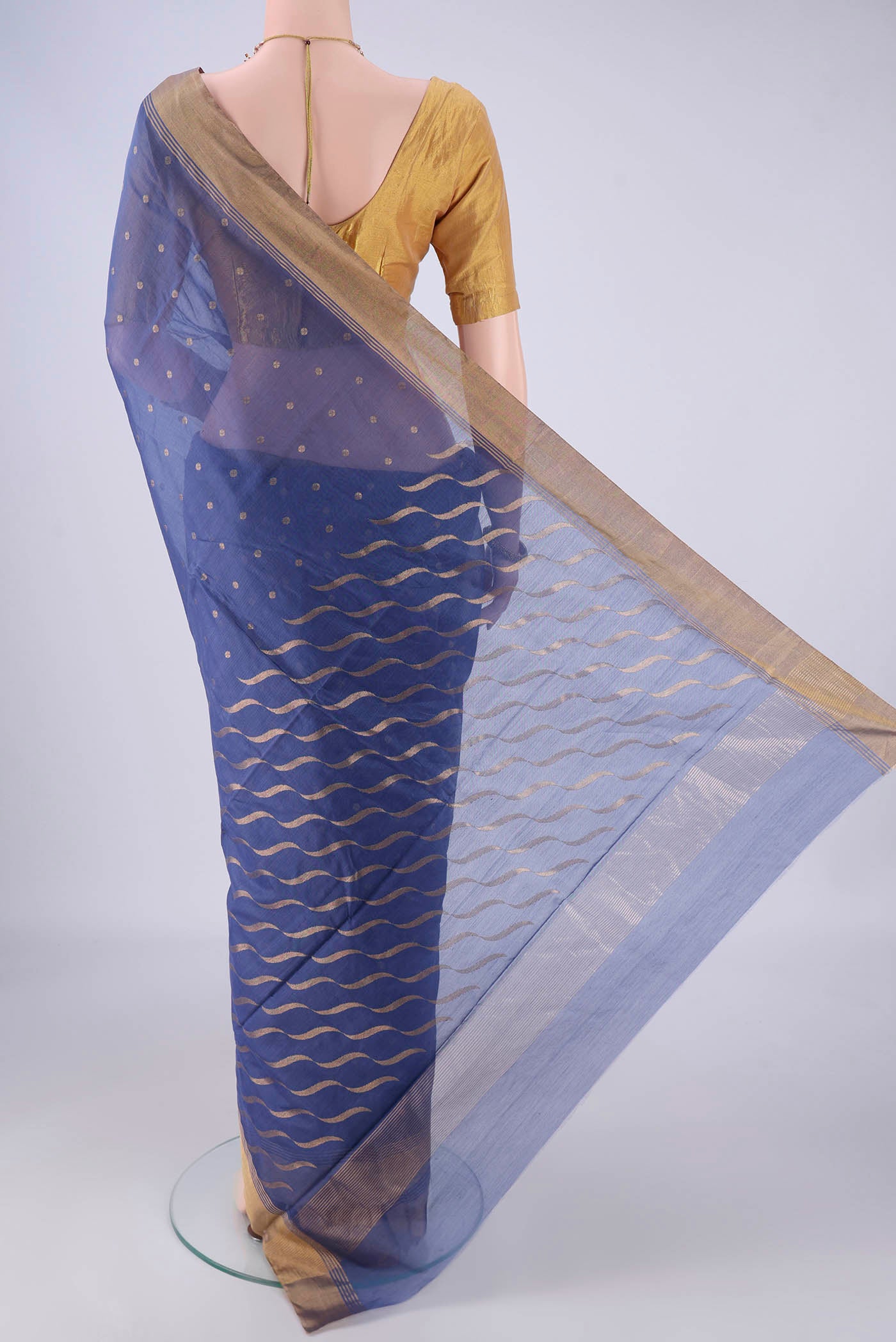 Flat view of Maya Blue Chanderi Silk Cotton Saree with Zari Butta on the body and Zari Border. 