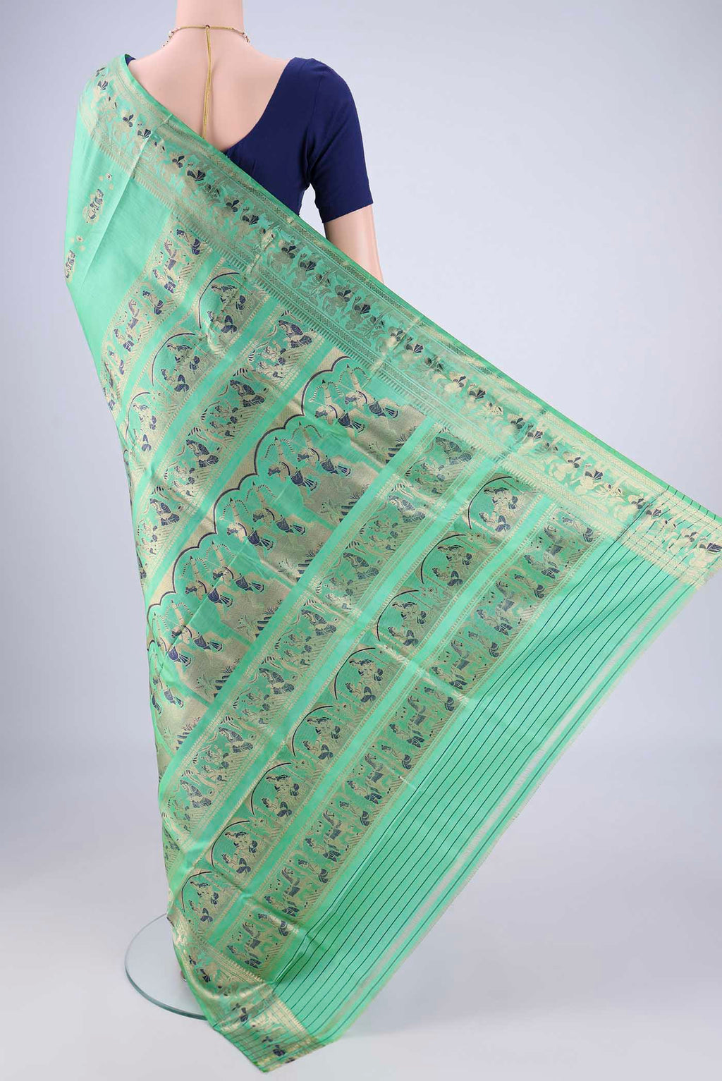 Flat view of Sea Green Baluchari Silk Saree with Zari And Thread Butta on the body and Zari And Thread Border. 
