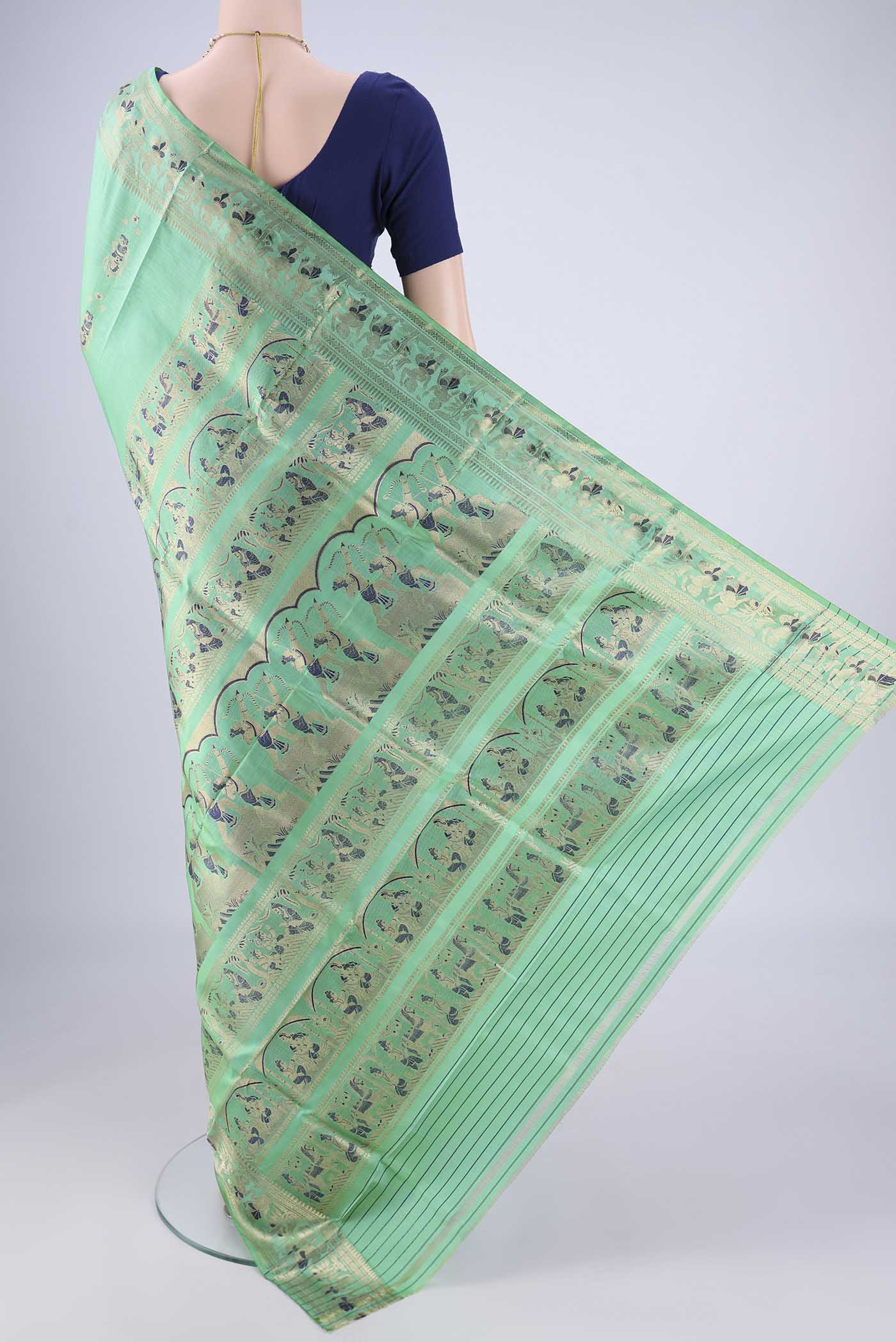 Flat view of Sea Green Baluchari Silk Saree with Zari And Thread Butta on the body and Zari And Thread Border. 