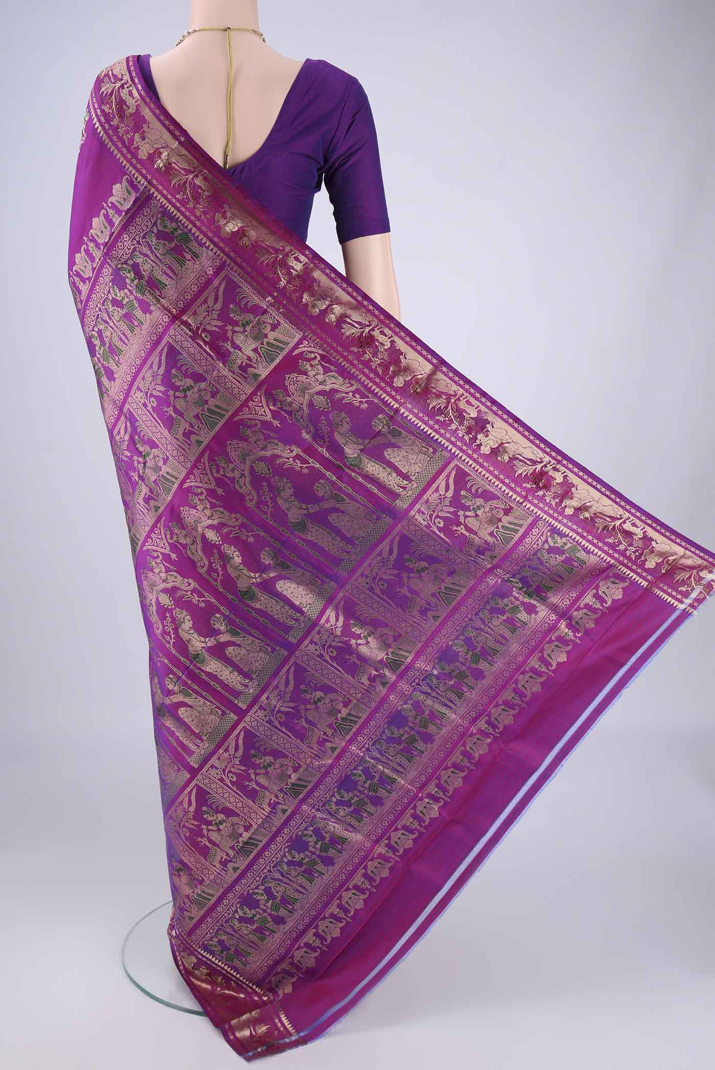 Flat view of Purple Baluchari Silk Saree with Zari And Thread Butta on the body and Zari And Thread Border. 