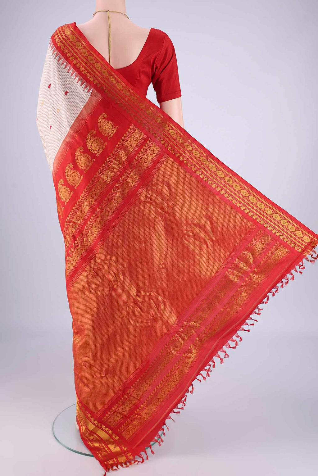 Flat view of Beige Gadwal Silk Saree with Checked design on the body and Silk Border. 