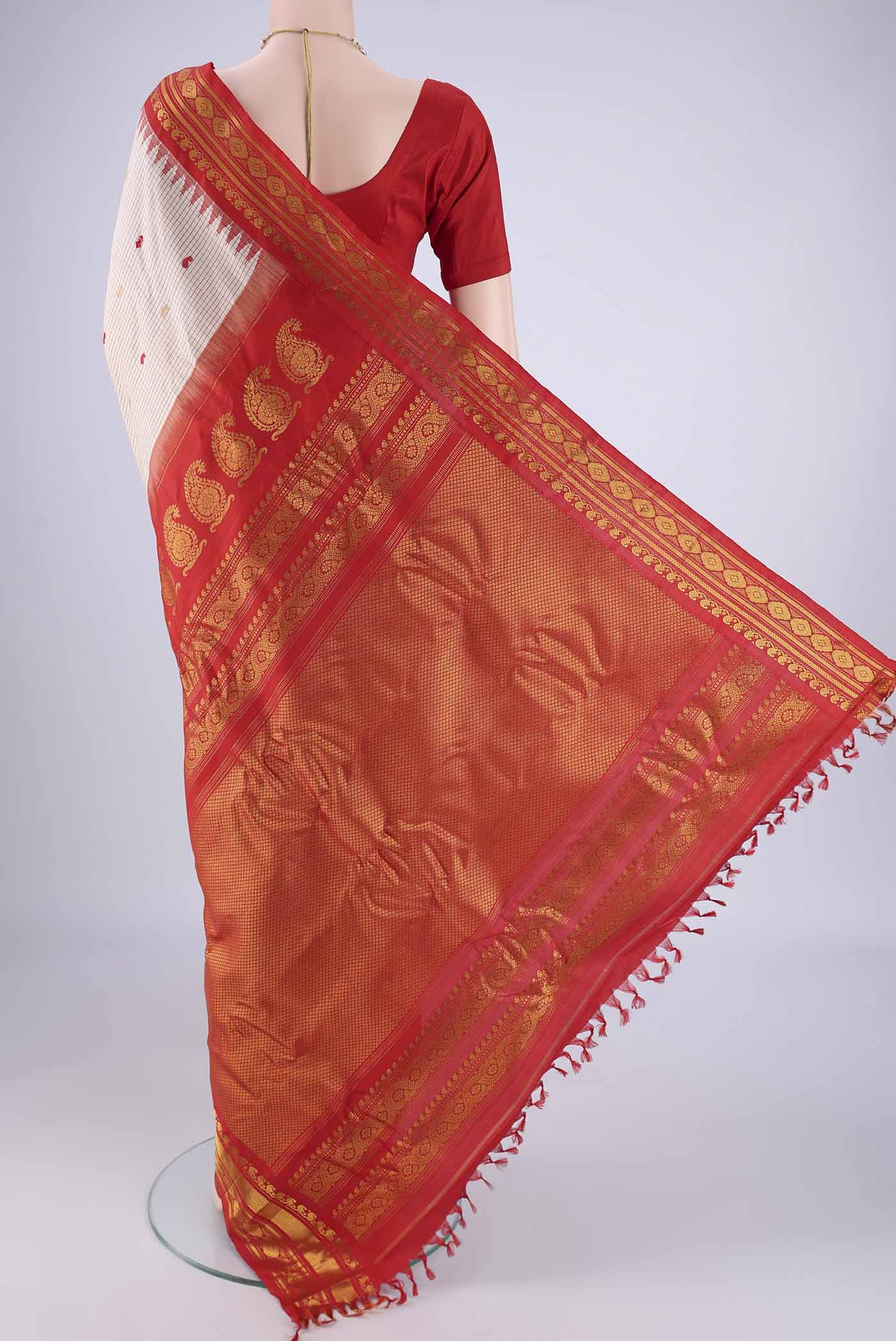 Flat view of Beige Gadwal Silk Saree with Checked design on the body and Silk Border. 