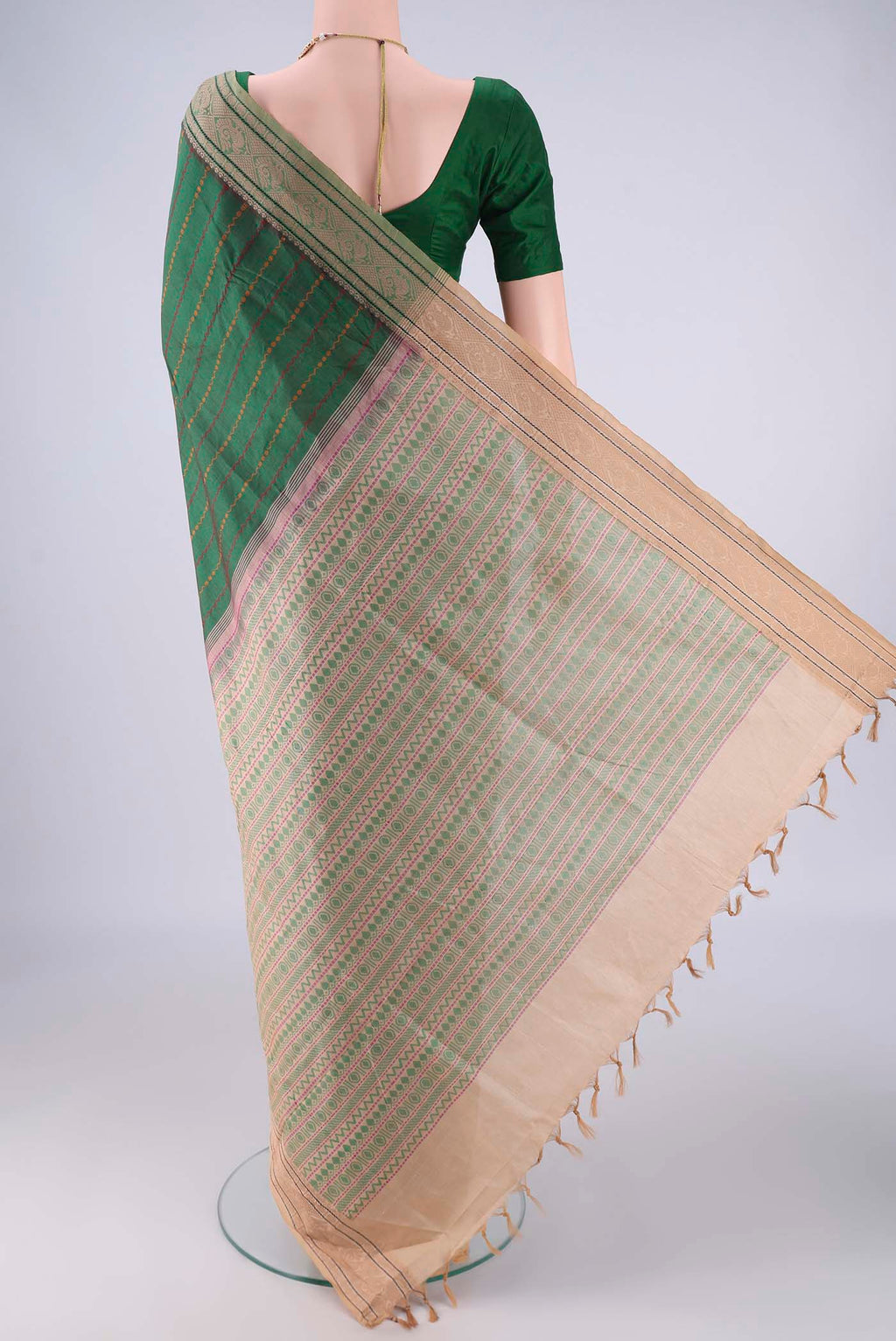 Flat view of Bottle Green Blended Poly Cotton Saree with Veldhari on the body and Thread Border. 