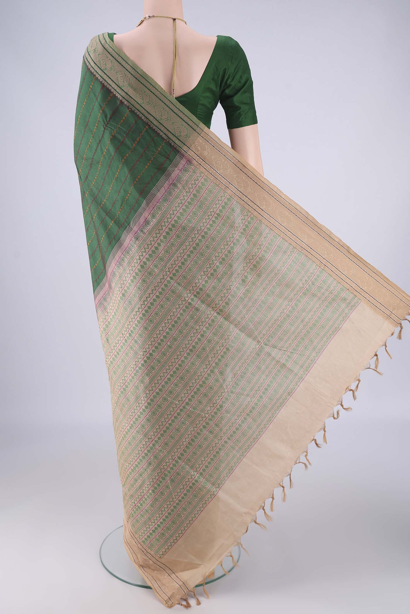 Flat view of Bottle Green Blended Poly Cotton Saree with Veldhari on the body and Thread Border. 