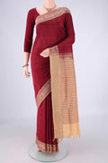 Maroon Blended Poly Cotton Saree with Stripes on the body and Thread Border.  displayed on a mannequin