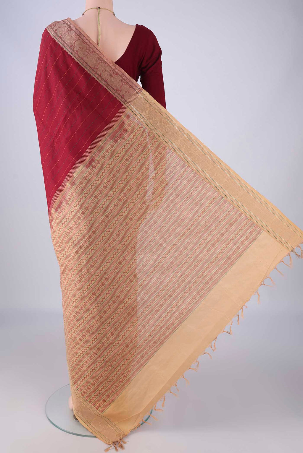 Flat view of Maroon Blended Poly Cotton Saree with Stripes on the body and Thread Border. 