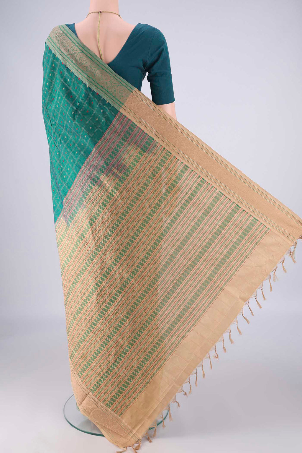 Flat view of Green Blended Poly Cotton Saree with Checked design on the body and Thread Border. 