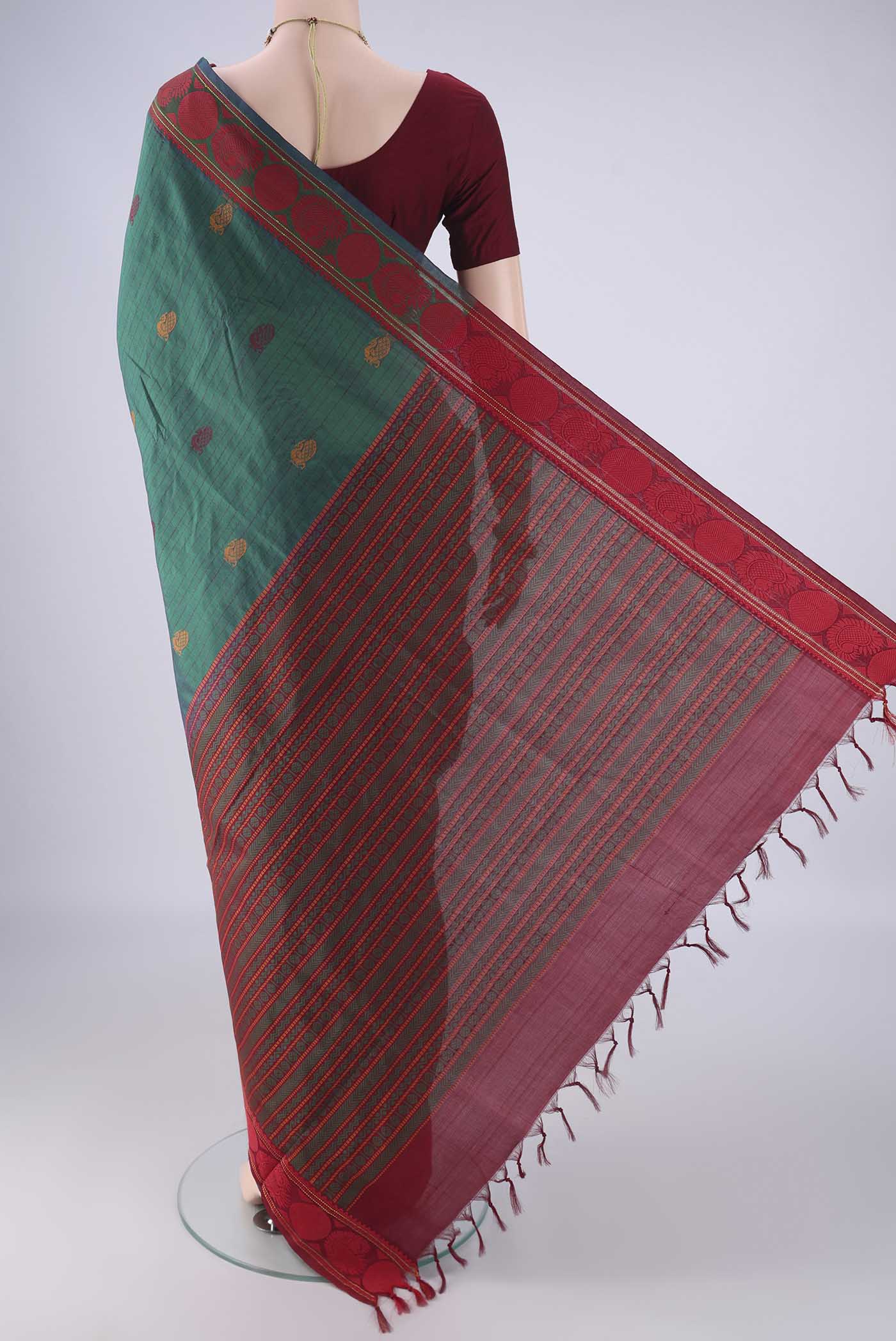 Flat view of Bottle Green Poly Cotton Saree with Checked design on the body and Thread Border. 