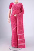 Rani Pink Pochampally Cotton Saree with Pure Ikat on the body and Ikat Border.  displayed on a mannequin