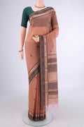 Coral Kanchi Cotton Saree with Thread Butta on the body and Zari Border.  displayed on a mannequin