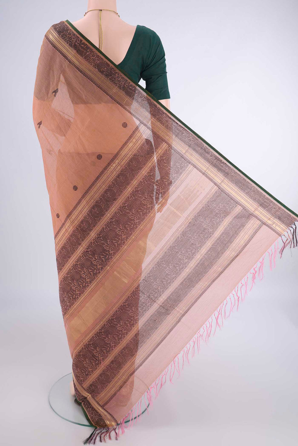 Flat view of Coral Kanchi Cotton Saree with Thread Butta on the body and Zari Border. 