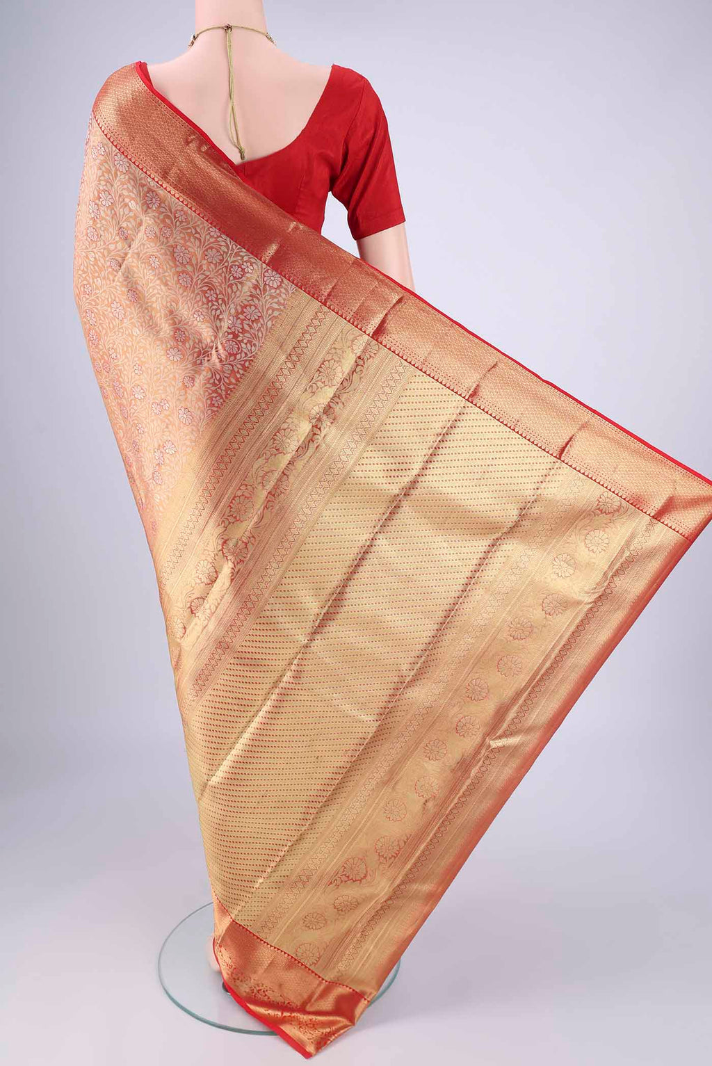 Flat view of Gold with Red Dual Tone Kanjivaram Tissue Silk Saree with Zari Brocade on the body and Zari Border. 