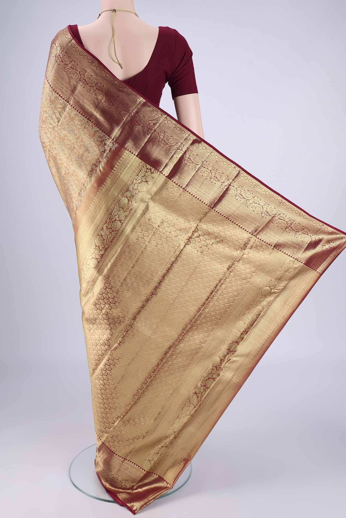 Flat view of Gold with Red Dual Tone Kanjivaram Tissue Silk Saree with Zari Brocade on the body and Zari Border. 