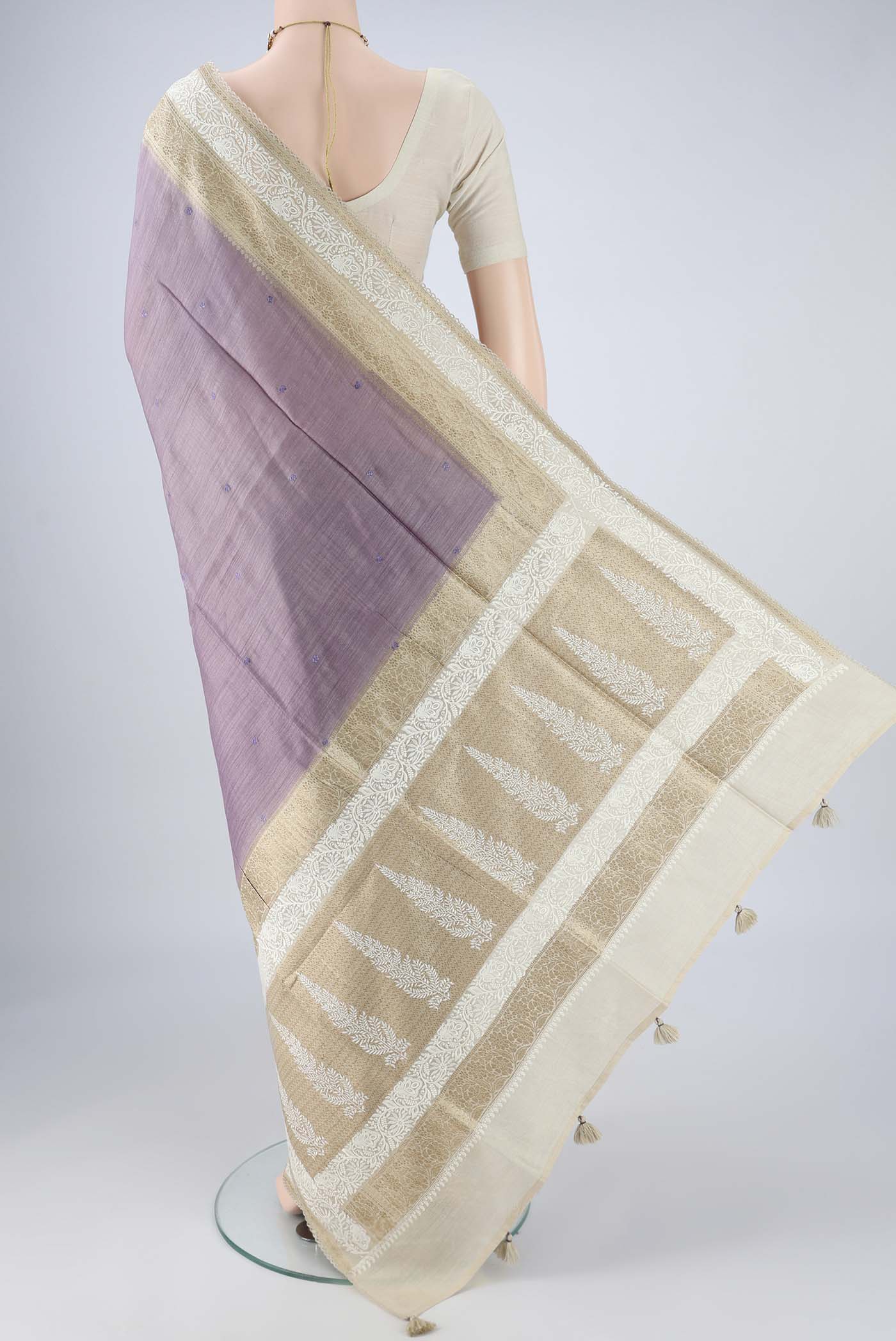 Flat view of Lavender MP Tussar Saree with Embroidery on the body and Zari And Thread Border. 