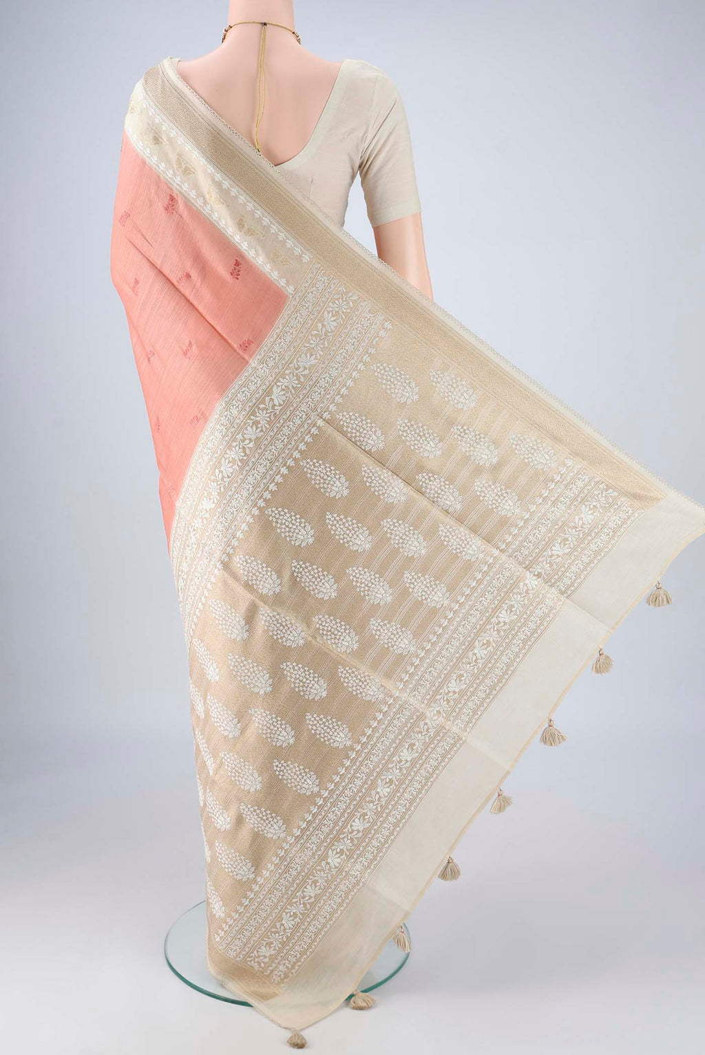 Flat view of Coral MP Tussar Saree with Embroidery on the body and Zari And Thread Border. 
