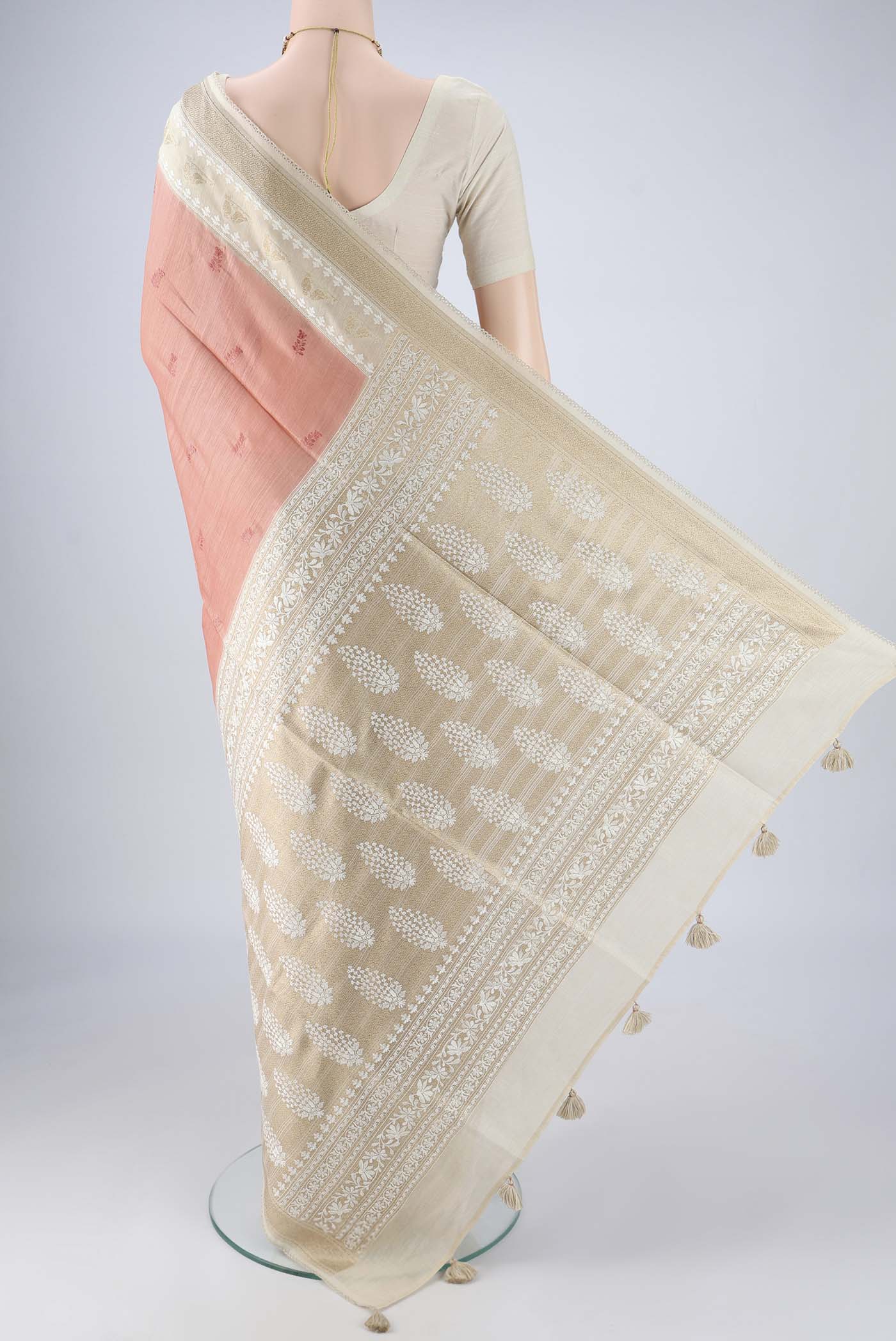 Flat view of Coral MP Tussar Saree with Embroidery on the body and Zari And Thread Border. 