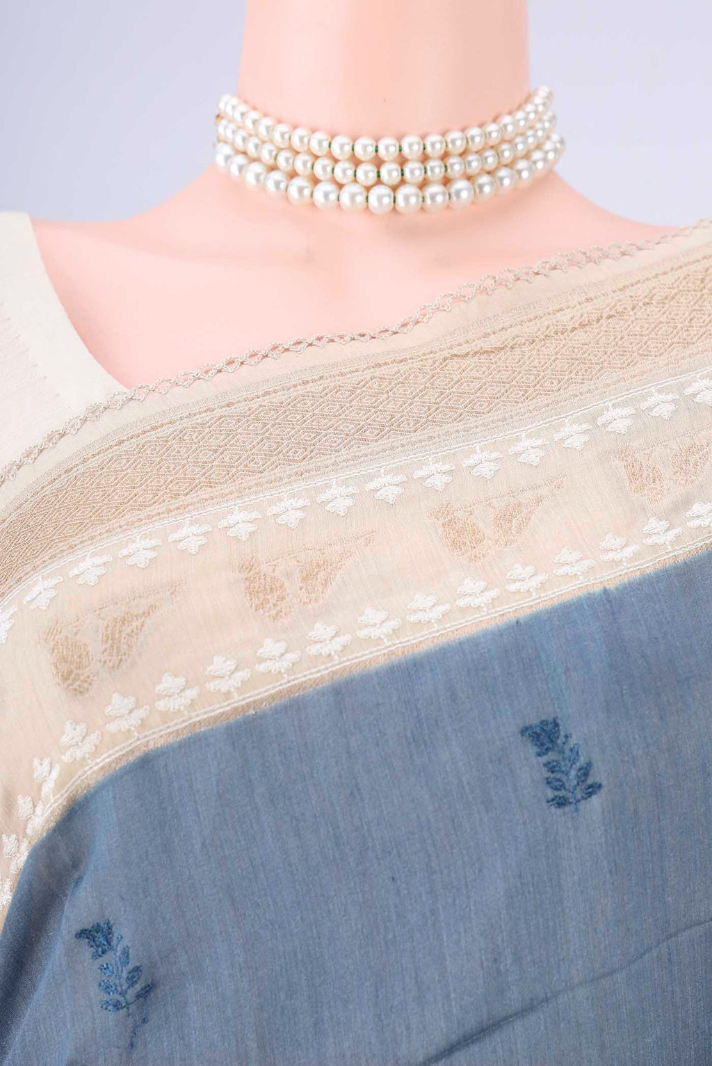 Border image of Blue Grey MP Tussar Saree with Embroidery on the body and Zari And Thread Border. 