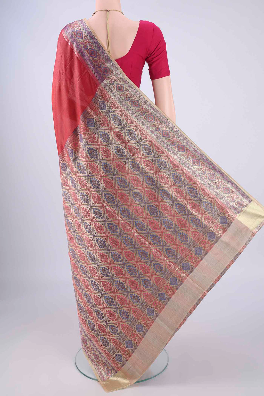 Flat view of Imperial Red Banarasi Tussar Silk Saree with Plain Body and Zari Border. 
