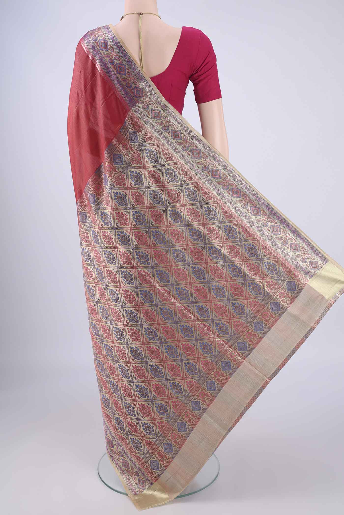 Flat view of Imperial Red Banarasi Tussar Silk Saree with Plain Body and Zari Border. 
