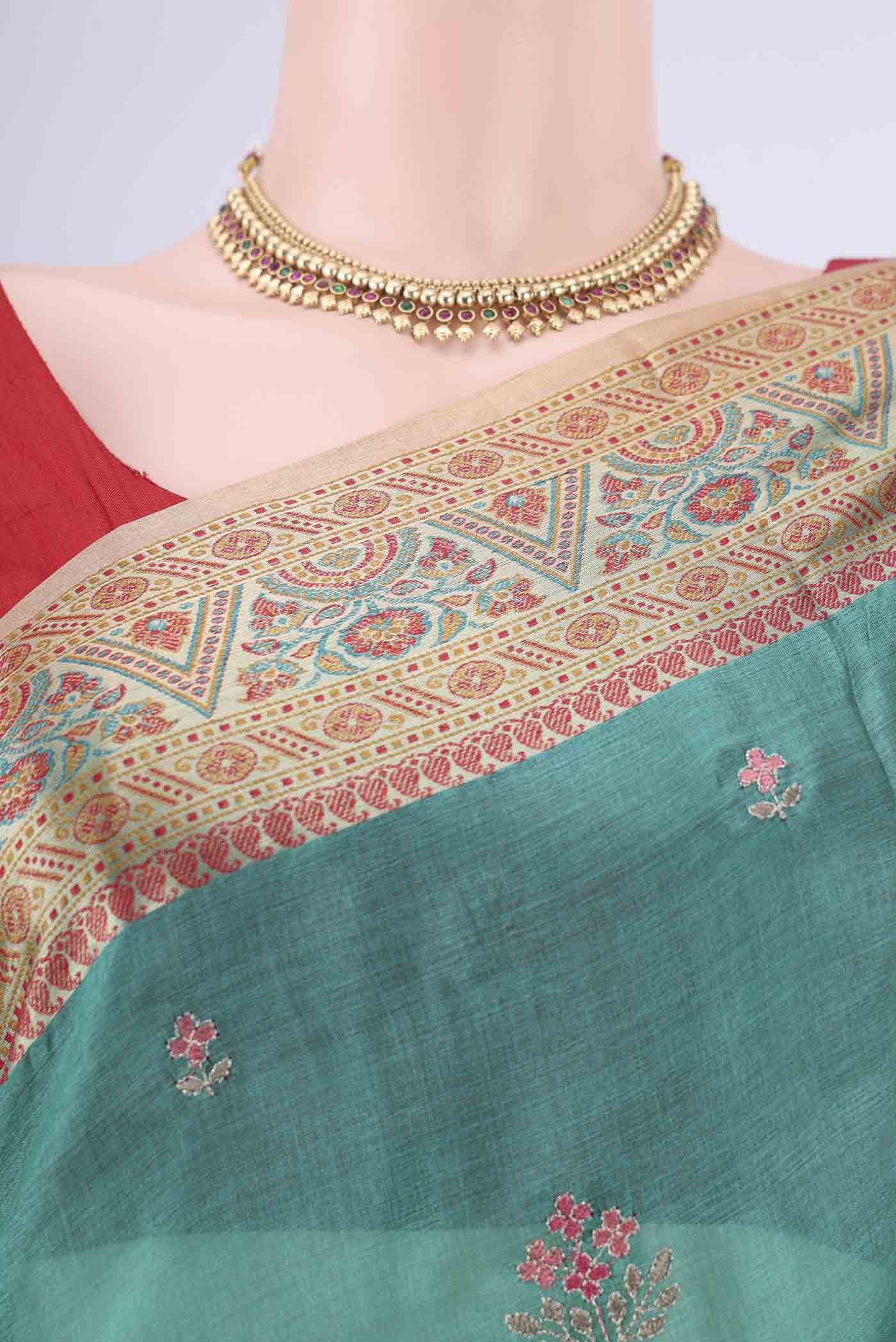 Border image of Sea Green Banarasi Tussar Silk Saree with Embroidery on the body and Zari Border. 