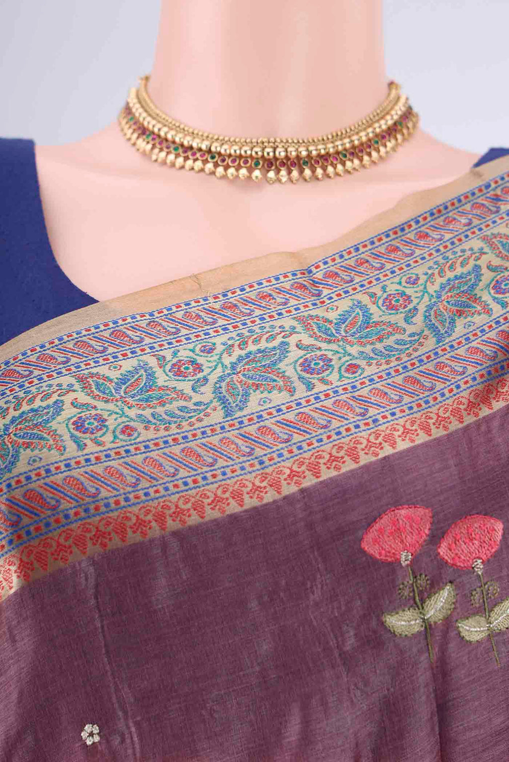 Border image of Dark Mauve Banarasi Tussar Silk Saree with Embroidery on the body and Zari Border. 