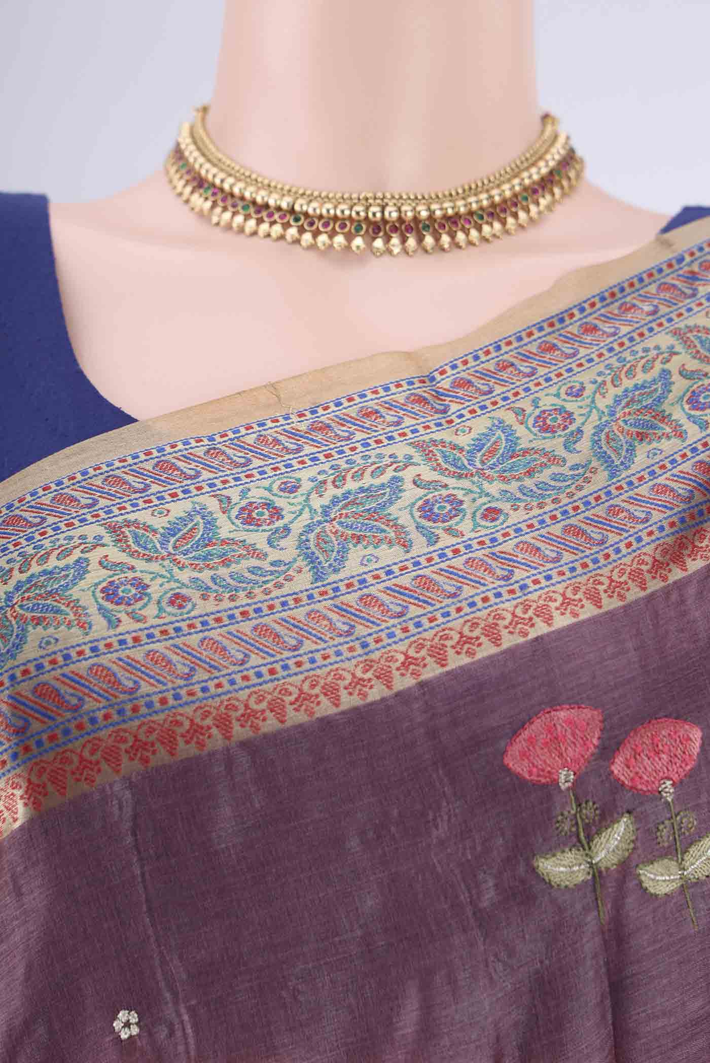 Border image of Dark Mauve Banarasi Tussar Silk Saree with Embroidery on the body and Zari Border. 