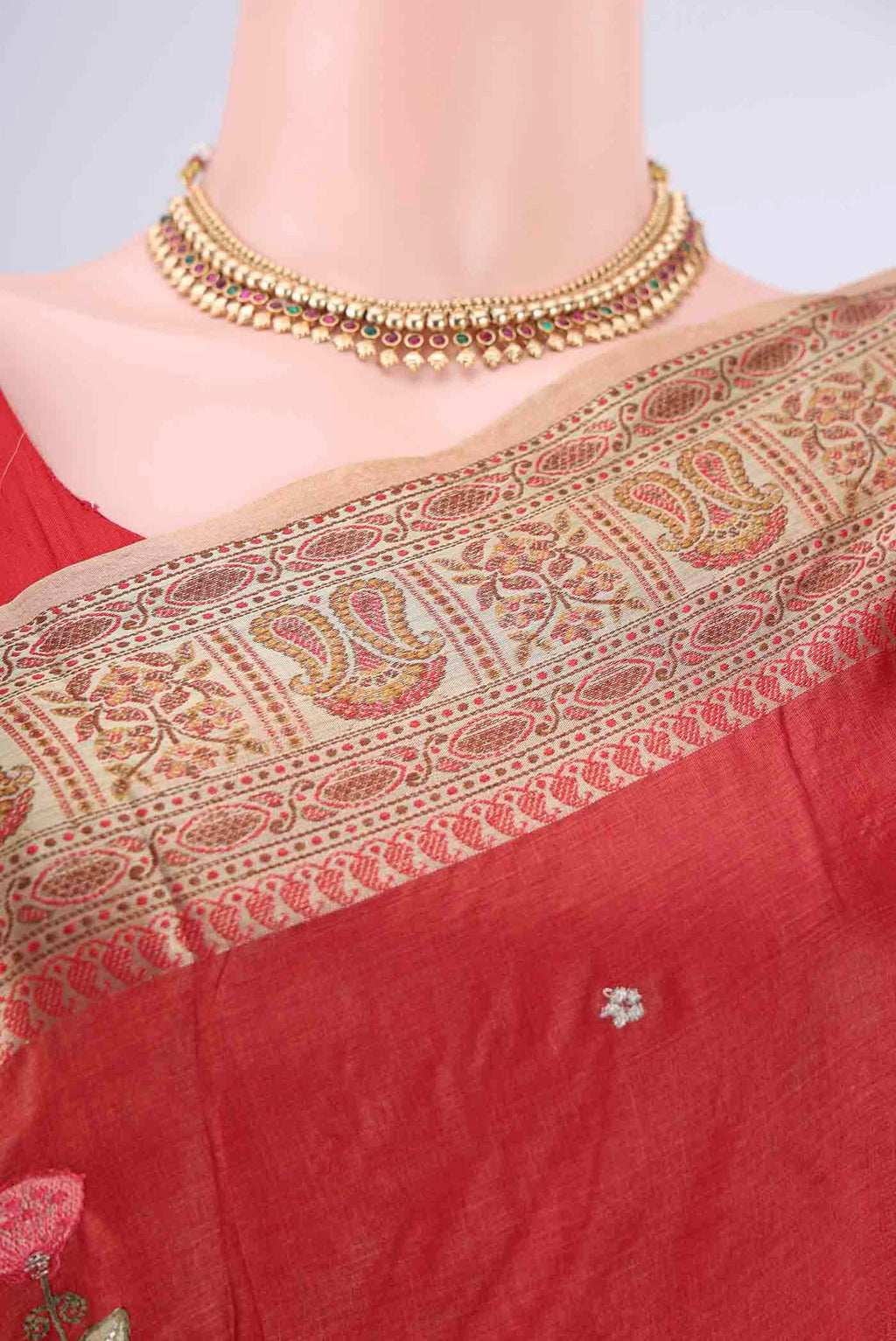 Border image of Red Banarasi Tussar Silk Saree with Embroidery on the body and Zari Border. 